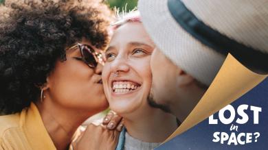 
		3 young women kissing each other
	